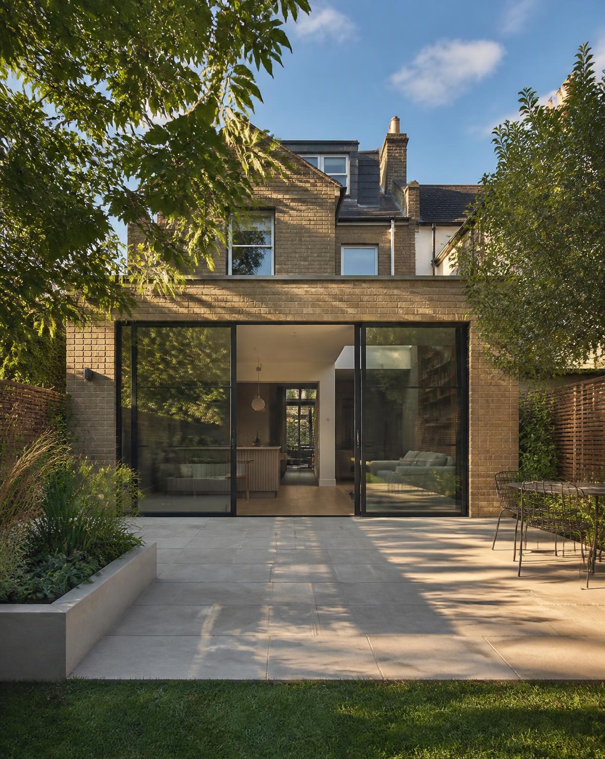 Completed London home extension with brickwork and full-height glazing